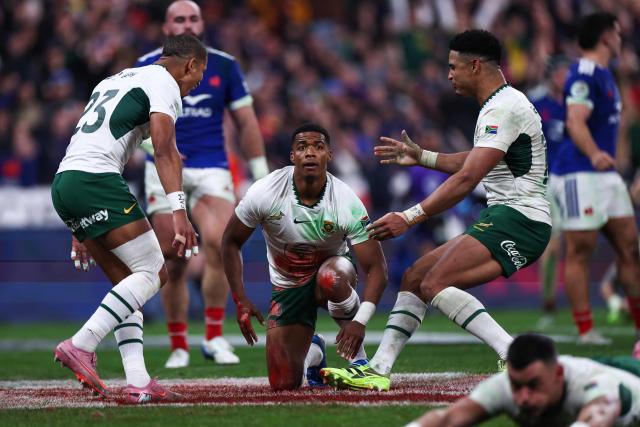 South Africa's scrum-half #22 Grant Williams celebrates after scoring his team's third try during the Autumn Nations Series international rugby union test match between France and South Africa at the Stade de France in Saint-Denis, Paris' suburb, on November 8, 2025. (Photo by FRANCK FIFE / AFP)