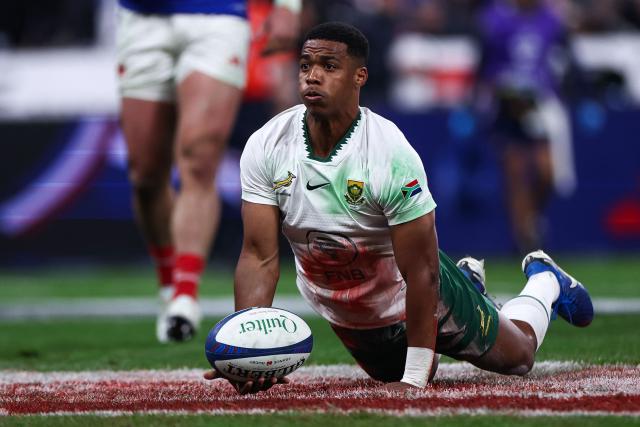South Africa's scrum-half #22 Grant Williams celebrates after scoring his team's third try during the Autumn Nations Series international rugby union test match between France and South Africa at the Stade de France in Saint-Denis, Paris' suburb, on November 8, 2025. (Photo by FRANCK FIFE / AFP)