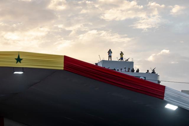 Supporters of Senegal’s Prime Minister Ousmane Sonko attend a rally in Dakar, on November 8, 2025. (Photo by PATRICK MEINHARDT / AFP)