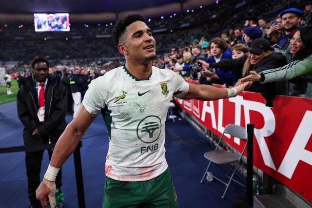 South Africa's fly-half #10 Sacha Feinberg-Mngomezulu greets supporters at the end of the Autumn Nations Series international rugby union test match between France and South Africa at the Stade de France in Saint-Denis, Paris' suburb, on November 8, 2025. (Photo by Franck FIFE / AFP)
