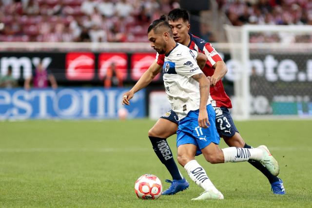 Monterrey's forward #17 Jesus Corona (front) and Guadalajara's US midfielder #23 Daniel Aguirre fight for the ball during the Liga MX Apertura football match between Guadalajara and Monterrey at the Akron Stadium in Zapopan, Mexico on November 8, 2025. (Photo by Ulises Ruiz / AFP)