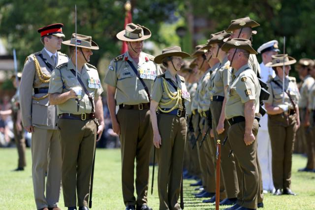 Britain's Princess Anne (C), Princess Royal, inspects the Centenary Parade at Victoria Barracks in Sydney on November 9, 2025. Princess Anne is visiting Australia to mark the Centenary of the Royal Australian Corps of Signals. (Photo by Damian Shaw / POOL / AFP)