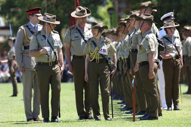Britain's Princess Anne (C), Princess Royal, inspects the Centenary Parade at Victoria Barracks in Sydney on November 9, 2025. Princess Anne is visiting Australia to mark the Centenary of the Royal Australian Corps of Signals. (Photo by Damian Shaw / POOL / AFP)