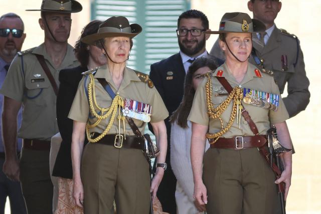 Britain's Princess Anne (C), Princess Royal, inspects the Centenary Parade at Victoria Barracks in Sydney on November 9, 2025. Princess Anne is visiting Australia to mark the Centenary of the Royal Australian Corps of Signals. (Photo by Damian Shaw / POOL / AFP)