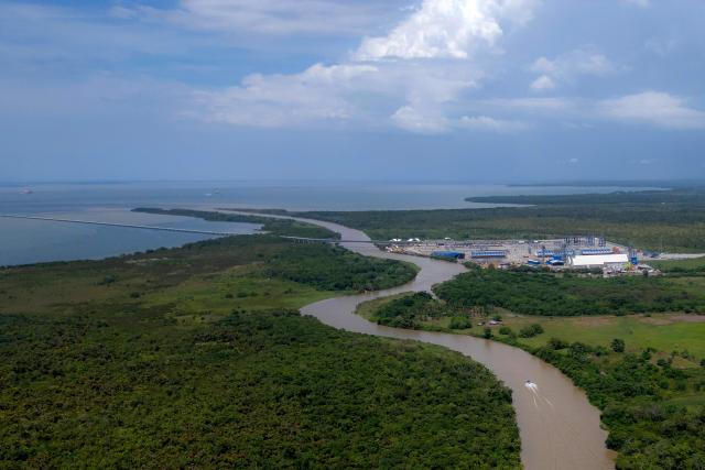 This aerial view shows Puerto Antioquia in the Gulf of Uraba, Antioquia department, Colombia on November 8, 2025. France's Foreign Affairs Minister Jean-Noel Barrot travelled to the troubled Gulf of Uraba to visit a huge port under construction, which is one of the largest French private investment projects in Colombia, according to the diplomatic delegation. (Photo by Luis ACOSTA / AFP)