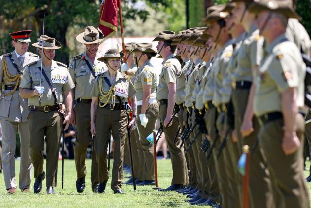 Britain's Princess Anne (C), Princess Royal, inspects the Centenary Parade at Victoria Barracks in Sydney on November 9, 2025. Princess Anne is visiting Australia to mark the Centenary of the Royal Australian Corps of Signals. (Photo by Damian Shaw / POOL / AFP)