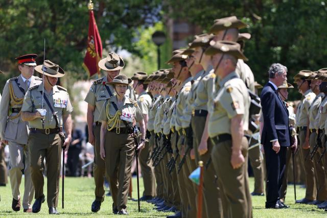 Britain's Princess Anne (C), Princess Royal, inspects the Centenary Parade at Victoria Barracks in Sydney on November 9, 2025. Princess Anne is visiting Australia to mark the Centenary of the Royal Australian Corps of Signals. (Photo by Damian Shaw / POOL / AFP)