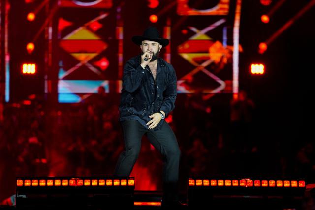 Mexican singer Carin Leon performs during the Boca Chueca Tour at El Campin stadium in Bogota on November 8, 2025. (Photo by Alejandro GONZALEZ / AFP)