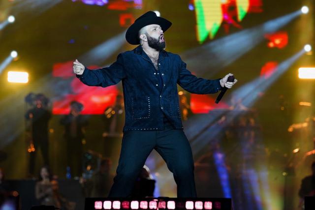 Mexican singer Carin Leon performs during the Boca Chueca Tour at El Campin stadium in Bogota on November 8, 2025. (Photo by Alejandro GONZALEZ / AFP)