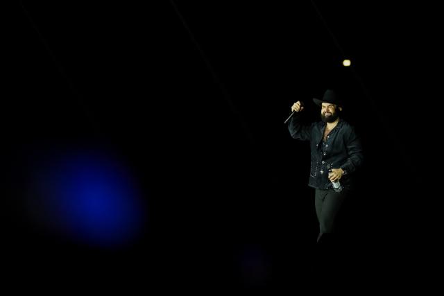 Mexican singer Carin Leon performs during the Boca Chueca Tour at El Campin stadium in Bogota on November 8, 2025. (Photo by Alejandro GONZALEZ / AFP)