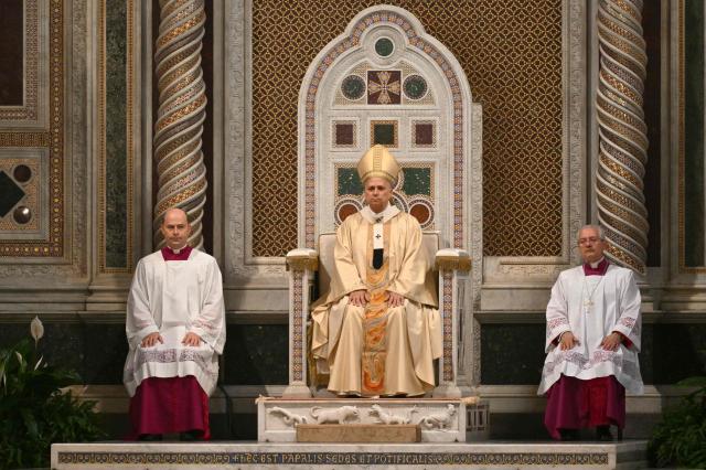 Pope Leo XIV presides over a mass at Saint John Lateran archbasilica in Rome, on November 9, 2025. (Photo by Alberto PIZZOLI / AFP)