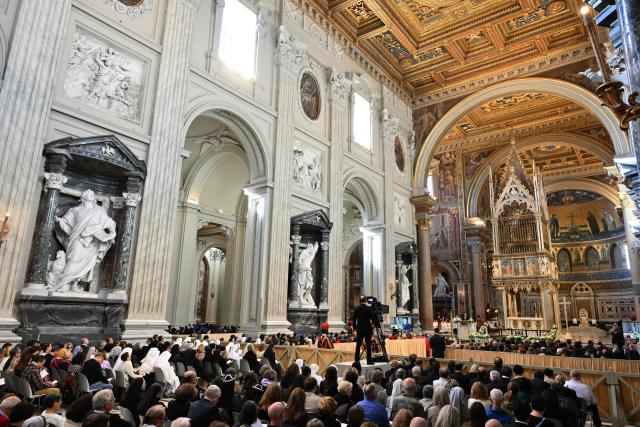 Pope Leo XIV (R) presides over a mass at Saint John Lateran archbasilica in Rome, on November 9, 2025. (Photo by Alberto PIZZOLI / AFP)