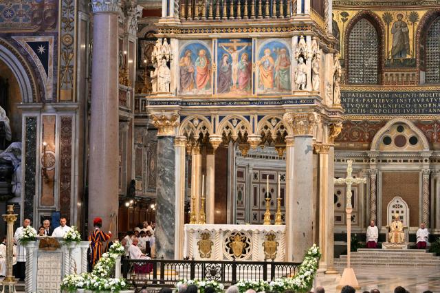 Pope Leo XIV (R) presides over a mass at Saint John Lateran archbasilica in Rome, on November 9, 2025. (Photo by Alberto PIZZOLI / AFP)