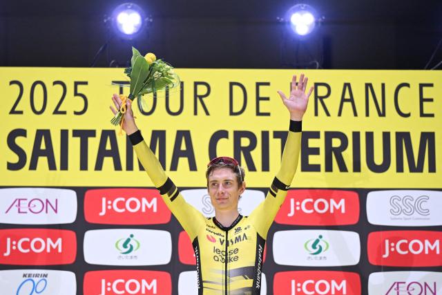 Team Visma-Lease a Bike rider Jonas Vingegaard Hansen of Denmark celebrates after winning the Tour de France Saitama Criterium cycling race in Saitama on November 9, 2025. (Photo by GREG BAKER / AFP)