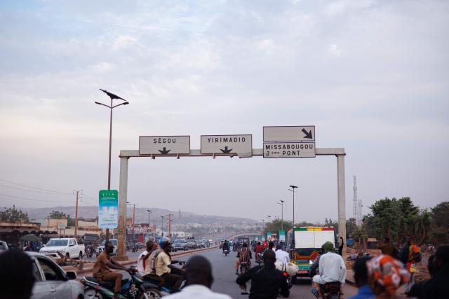 Motorists are seen in Bamako on November 8, 2025. France on November 7, 2025 advised French nationals to temporarily leave Mali "as soon as possible", as a jihadist blockade upends daily life in the capital Bamako and other regions of the west African country.
The Al-Qaeda-linked Group for the Support of Islam and Muslims (JNIM) has since September been targeting fuel tankers, particularly those coming from Senegal and Ivory Coast, through which the majority of Mali's imported goods transit. (Photo by AFP)