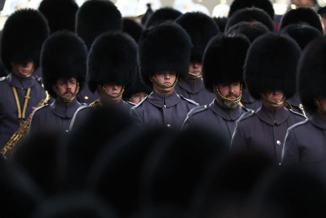 Guardsmen form up for the Remembrance Sunday ceremony at the Cenotaph on Whitehall in central London on November 9, 2025. Remembrance Sunday is an annual commemoration held on the closest Sunday to Armistice Day, November 11, the anniversary of the end of the First World War and services across Commonwealth countries remember servicemen and women who have fallen in the line of duty since WWI. (Photo by HENRY NICHOLLS / POOL / AFP)