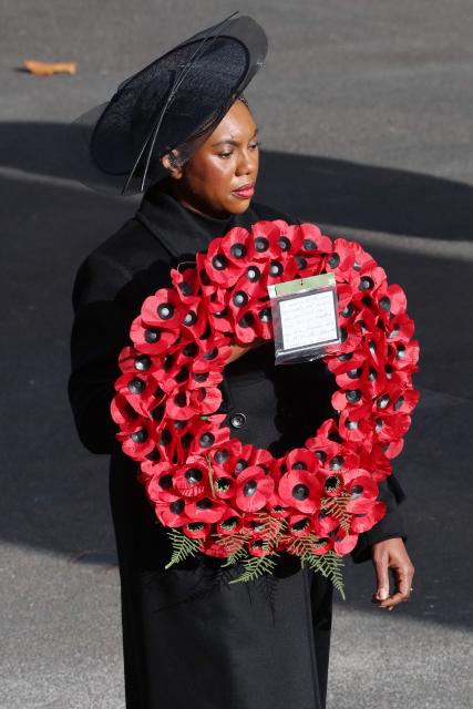 Britain's main opposition Conservative Party leader, Kemi Badenoch lays a wreath during the Remembrance Sunday ceremony at the Cenotaph on Whitehall in central London on November 9, 2025. Remembrance Sunday is an annual commemoration held on the closest Sunday to Armistice Day, November 11, the anniversary of the end of the First World War and services across Commonwealth countries remember servicemen and women who have fallen in the line of duty since WWI. (Photo by Chris Jackson / POOL / AFP)