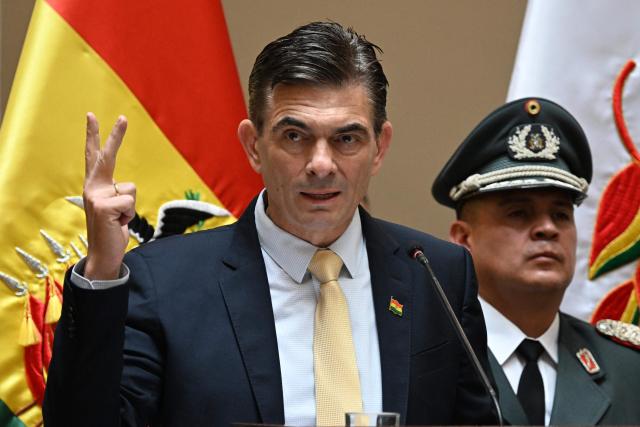 Bolivia's President Rodrigo Paz delivers a speech during the inauguration ceremony of his cabinet at the Palacio Quemado government in La Paz, on November 9, 2025. Rodrigo Paz, a pro-business conservative, took office Saturday as Bolivia's president, ending nearly 20 years of socialist rule and inheriting acute economic woes. (Photo by AIZAR RALDES / AFP)