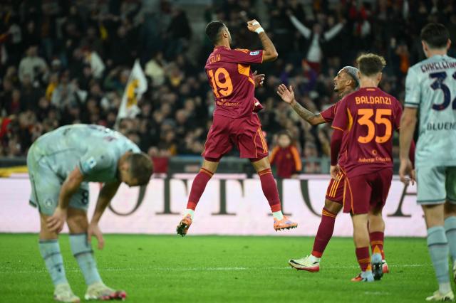 Roma's Turkish defender #19 Zeki Celik celebrates after scoring during the Italian Serie A football match between AS Roma and Udinese at the Olympic Stadium in Rome on November 9, 2025. (Photo by Alberto PIZZOLI / AFP)