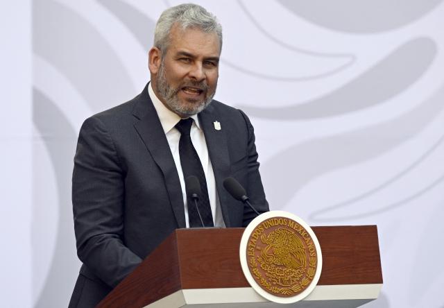 Governor of Michoacan Alfredo Ramirez Bedolla speaks during the presentation of the Michoacan Plan for Peace and Justice at the National Palace in Mexico City on November 9, 2025. Claudia Sheinbaum's government announced on November 9, 2024, that it would reinforce the military presence and official authorities in the western state of Michoacan following the murder of a mayor that has outraged the whole of Mexico. (Photo by Alfredo ESTRELLA / AFP)