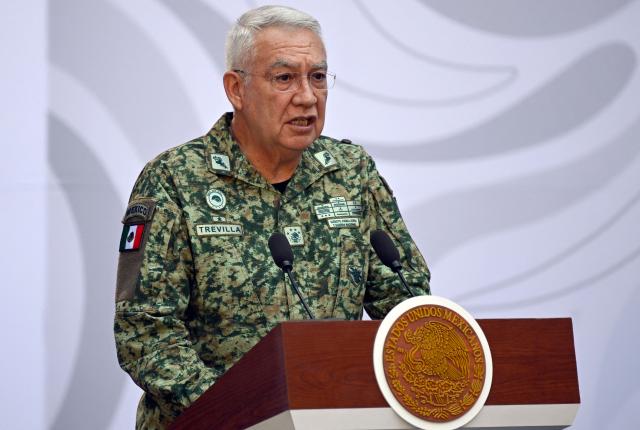 Mexico's Secretary of Defense Ricardo Trevilla Trejo speaks during the presentation of the Michoacan Plan for Peace and Justice at the National Palace in Mexico City on November 9, 2025. Claudia Sheinbaum's government announced on November 9, 2024, that it would reinforce the military presence and official authorities in the western state of Michoacan following the murder of a mayor that has outraged the whole of Mexico. (Photo by Alfredo ESTRELLA / AFP)