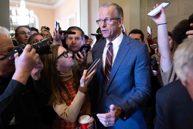 US Senate Majority Leader John Thune, Republican from South Dakota, speaks with reporters outside his office on day 41 of the federal government shutdown, at the US Capitol in Washington, DC, November 10, 2025. The US Senate on November 9 took a major step toward ending the longest government shutdown in American history when it cleared the way for a formal debate on a motion to resume funding to federal agencies. The development represents significant progress toward ending a government shutdown that has dragged on for over 40 days, halted funding to federal programs and disrupted air travel and other essential industries. (Photo by SAUL LOEB / AFP)