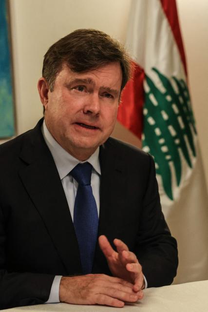 US Assistant Secretary for Terrorist Financing and Financial Intelligence at the US Treasury Department John Hurley, speaks during an interview with a number of journalists, at the US Embassy in Awkar, north of the Lebanese capital Beirut on November 10, 2025. During his visit on November 10, 2025, Hurley said that his country was 'very serious' about halting the flow of money from Iran to the Iran-backed Hezbollah group. (Photo by Anwar AMRO / AFP)