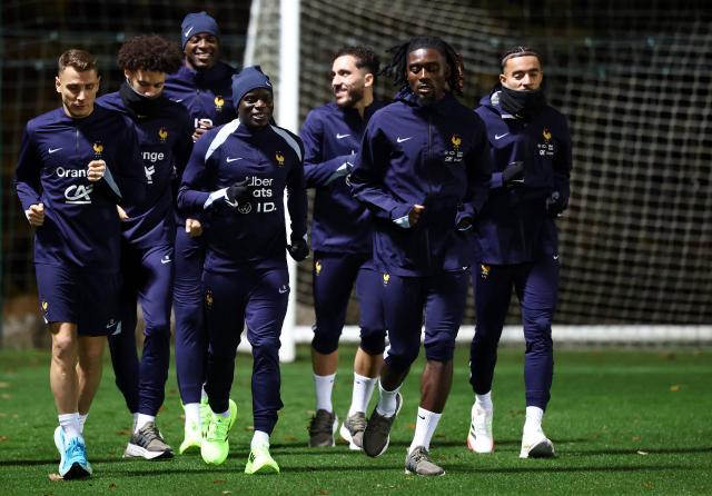 (From L) France's defender #21 Lucas Digne, France's midfielder Ngolo Kante, France's forward Rayan Cherki, France's midfielder #13 Manu Kone and France's defender #17 Malo Gusto take part in a training session as part of the preparations for the upcoming FIFA World Cup 2026 Group D European qualification football matches, at the team's training grounds in Clairefontaine-en-Yvelines, southwest of Paris, on November 10, 2025. France will face Ukraine on November 13 and Azerbaidjan on November 17, 2025. (Photo by FRANCK FIFE / AFP)