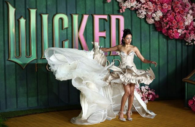 Brazilian influencer Isabela Grutman poses on the red carpet upon arrival for the European premiere of the film "Wicked: For Good" in central London on November 10, 2025. (Photo by HENRY NICHOLLS / AFP)