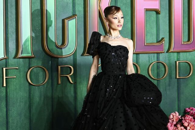 US actor Ariana Grande poses on the red carpet upon arrival for the European premiere of the film "Wicked: For Good" in central London on November 10, 2025. (Photo by HENRY NICHOLLS / AFP)