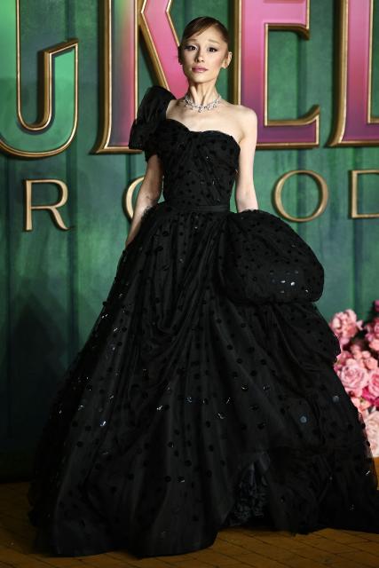 US actor Ariana Grande poses on the red carpet upon arrival for the European premiere of the film "Wicked: For Good" in central London on November 10, 2025. (Photo by HENRY NICHOLLS / AFP)