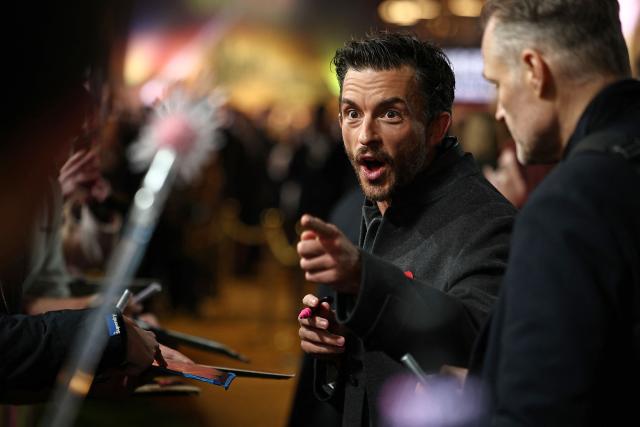 British actor Jonathan Bailey speaks with fans as he attends the European premiere of the film "Wicked: For Good" in central London on November 10, 2025. (Photo by HENRY NICHOLLS / AFP)