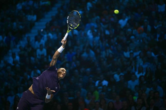 Canada's Felix Auger-Aliassime serves during his match against Italy's Jannik Sinner at the ATP Finals tennis tournament in Turin on November 10, 2025. (Photo by Marco BERTORELLO / AFP)