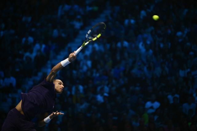 Canada's Felix Auger-Aliassime serves against Italy's Jannik Sinner at the ATP Finals tennis tournament in Turin on November 10, 2025. (Photo by Marco BERTORELLO / AFP)