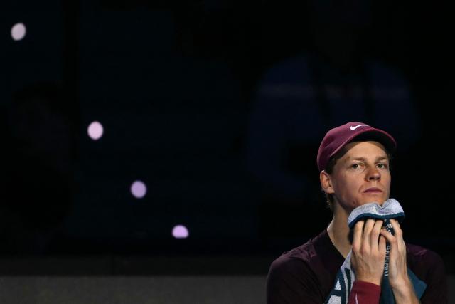 Italy's Jannik Sinner looks on during a break in his match against Canada's Felix Auger-Aliassime at the ATP Finals tennis tournament in Turin on November 10, 2025. (Photo by Marco BERTORELLO / AFP)