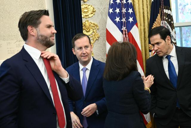 (L-R) US Vice President JD Vance, Sergio Gor, US Attorney for the District of Columbia Jeanine Pirro and US Secretary of State Marco Rubio attend a swearing-in ceremony for Gor as US Ambassador to India, in the Oval Office of the White on November 10, 2025 in Washington, DC. (Photo by Brendan SMIALOWSKI / AFP)