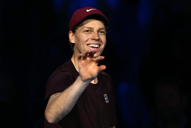 Italy's Jannik Sinner gestures after winning his match against Canada's Felix Auger-Aliassime at the ATP Finals tennis tournament in Turin on November 10, 2025. (Photo by Marco BERTORELLO / AFP)