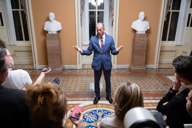 US Senate Majority Leader John Thune, Republican of South Dakota, speaks with reporters following a Senate vote to end the government shutdown at the US Capitol in Washington, DC, November 10, 2025. The longest-ever US government shutdown moved forward Monday toward an eventual resolution, after several Democratic senators broke ranks to join Republicans in a 60-40 vote passing a compromise deal, sparking intra-party backlash. (Photo by SAUL LOEB / AFP)