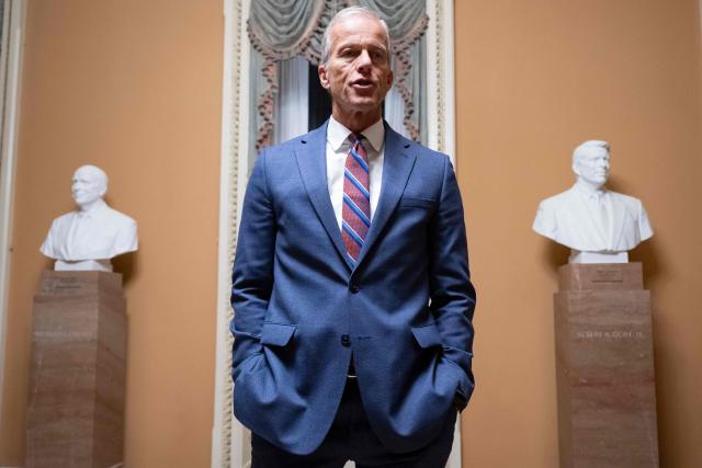 US Senate Majority Leader John Thune, Republican of South Dakota, speaks with reporters following a Senate vote to end the government shutdown at the US Capitol in Washington, DC, November 10, 2025. The longest-ever US government shutdown moved forward Monday toward an eventual resolution, after several Democratic senators broke ranks to join Republicans in a 60-40 vote passing a compromise deal, sparking intra-party backlash. (Photo by SAUL LOEB / AFP)