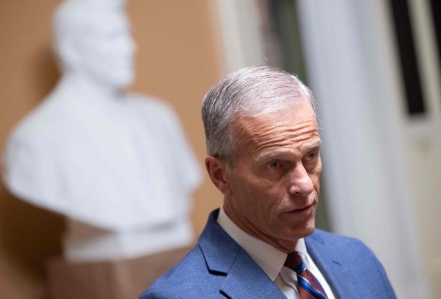 US Senate Majority Leader John Thune, Republican of South Dakota, speaks with reporters following a Senate vote to end the government shutdown at the US Capitol in Washington, DC, November 10, 2025. The longest-ever US government shutdown moved forward Monday toward an eventual resolution, after several Democratic senators broke ranks to join Republicans in a 60-40 vote passing a compromise deal, sparking intra-party backlash. (Photo by SAUL LOEB / AFP)