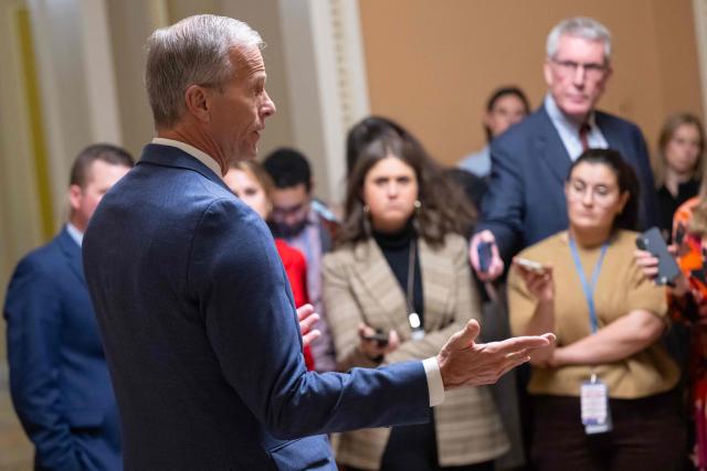 US Senate Majority Leader John Thune, Republican of South Dakota, speaks with reporters following a Senate vote to end the government shutdown at the US Capitol in Washington, DC, November 10, 2025. The longest-ever US government shutdown moved forward Monday toward an eventual resolution, after several Democratic senators broke ranks to join Republicans in a 60-40 vote passing a compromise deal, sparking intra-party backlash. (Photo by SAUL LOEB / AFP)