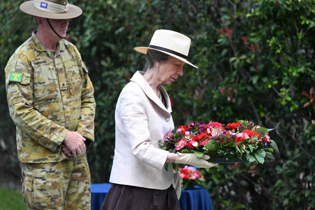 Britain's Princess Anne (R), Princess Royal, lays a wreath to commemorate Remembrance Day during a service held at Gallipoli Barracks in Brisbane on November 11, 2025. Remembrance Day is observed across Commonwealth countries to mark the anniversary of the end of the First World War and to remember servicemen and women who have fallen in the line of duty since WWI. (Photo by DARREN ENGLAND / POOL / AFP)