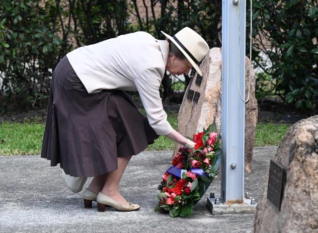 Britain's Princess Anne, Princess Royal, lays a wreath to commemorate Remembrance Day during a service held at Gallipoli Barracks in Brisbane on November 11, 2025. Remembrance Day is observed across Commonwealth countries to mark the anniversary of the end of the First World War and to remember servicemen and women who have fallen in the line of duty since WWI. (Photo by DARREN ENGLAND / POOL / AFP)