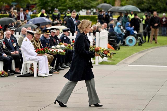 Victoria's Premier Jacinta Allan lays a wreath during a Remembrance Day service at the Shrine of Remembrance in Melbourne on November 11, 2025. Remembrance Day is observed across Commonwealth countries to mark the anniversary of the end of the First World War and to remember servicemen and women who have fallen in the line of duty since WWI. (Photo by William WEST / AFP)