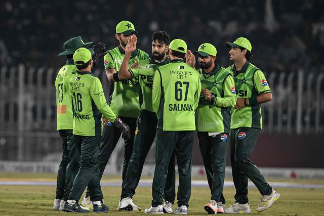 Pakistan's Haris Rauf (C) celebrates with teammates after taking the wicket of Sri Lanka's Pathum Nissanka during the first one-day international (ODI) cricket match between Pakistan and Sri Lanka at the Rawalpindi Cricket Stadium in Rawalpindi on November 11, 2025. (Photo by Aamir QURESHI / AFP)