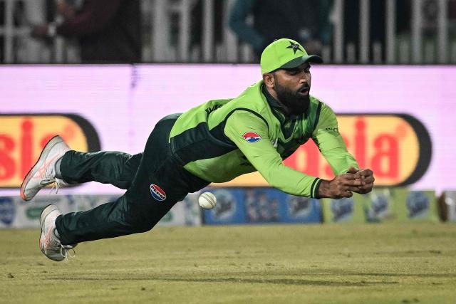 Pakistan's Fakhar Zaman drops a catch of Sri Lanka's captain Charith Asalanka during the first one-day international (ODI) cricket match between Pakistan and Sri Lanka at the Rawalpindi Cricket Stadium in Rawalpindi on November 11, 2025. (Photo by Aamir QURESHI / AFP)