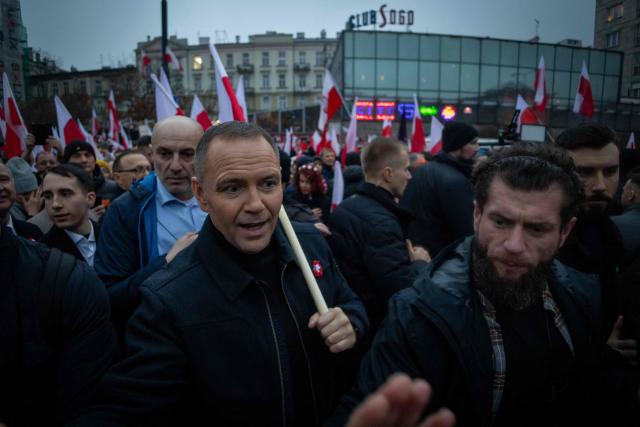 Poland's President Karol Nawrocki takes part in the Poland's Independence Day march origanized by nationalist groups in Warsaw, Poland on November 11, 2025. (Photo by Wojtek RADWANSKI / AFP)