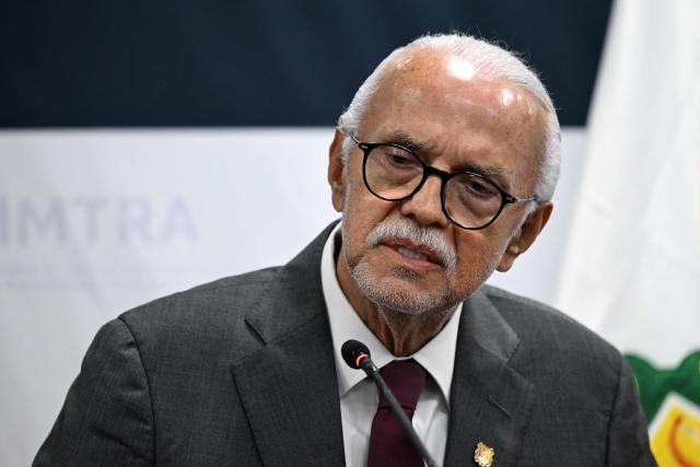 The governor of the state of Nayarit, Miguel Angel Navarro, speaks during a press conference to present results on the "Mega Operativo Nuevo Nayarit" at the Specialized Prosecutor's Office for Organized Crime (FEMDO) building in Mexico City on November 11, 2025. (Photo by Yuri CORTEZ / AFP)
