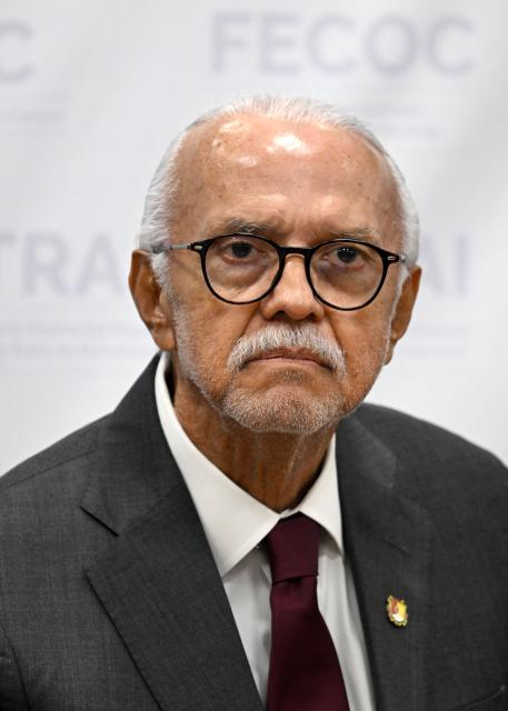 The governor of the state of Nayarit, Miguel Angel Navarro, speaks during a press conference to present results on the "Mega Operativo Nuevo Nayarit" at the Specialized Prosecutor's Office for Organized Crime (FEMDO) building in Mexico City on November 11, 2025. (Photo by Yuri CORTEZ / AFP)