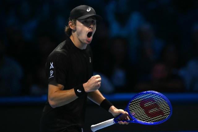 Australia's Alex De Minaur reacts during his match against Italy's Lorenzo Musetti at the ATP Finals tennis tournament in Turin on November 11, 2025. (Photo by Marco BERTORELLO / AFP)
